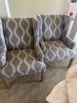 Two Bassett wing back chairs
