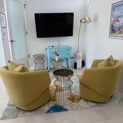 Two mid Century Modern Swivel Chairs 