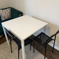 IKEA White Dining Table with 2 Chairs – Modern & Clean