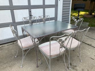 Metal + glass table with 6 chairs