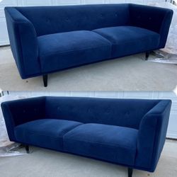 Brand new. (Set of 2) Mid-century modern sofa. Blue velvet fabric. Set Retails over $2600. 
