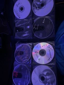60+ rap music CDs lmk filled with very popular rappers only