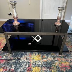 “The sexiest coffee table ever” - one prospective home buyer at our open house. This coffee table comes with two side tables , and are sleek and sexy.