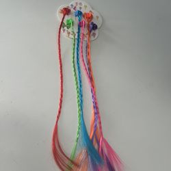 set of colorful, braided hair extensions with attached beads.
