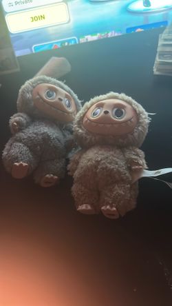 labubus, grey one $30 the brown one $25