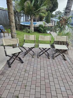 4 Folding wood deck chairs