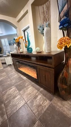 84” inches long fireplace /tv stand in excellent condition