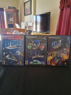 3 Playstation  2 PS 2 Games comes all together  as a bundle  SLY  COOPER  & The Thievius  Raccoonus  & SLY 2 BAND OF THIEVES & SLY 3 HONOR AMONG THIEV