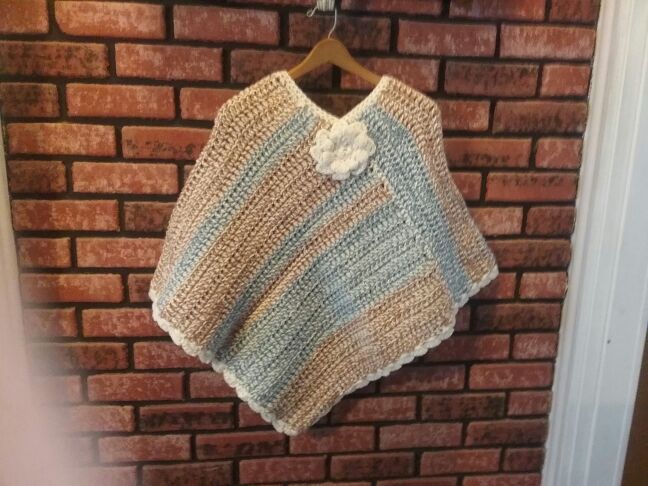 New, one of a kind, ladies or teenagers poncho