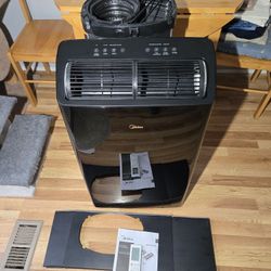 MIDEA 14,000 BTU PORTABLE WITH BUILT-IN DEHUMIDIFIER AND HEATER  WIFI CAPABILITY. BASICALLY, BRAND NEW