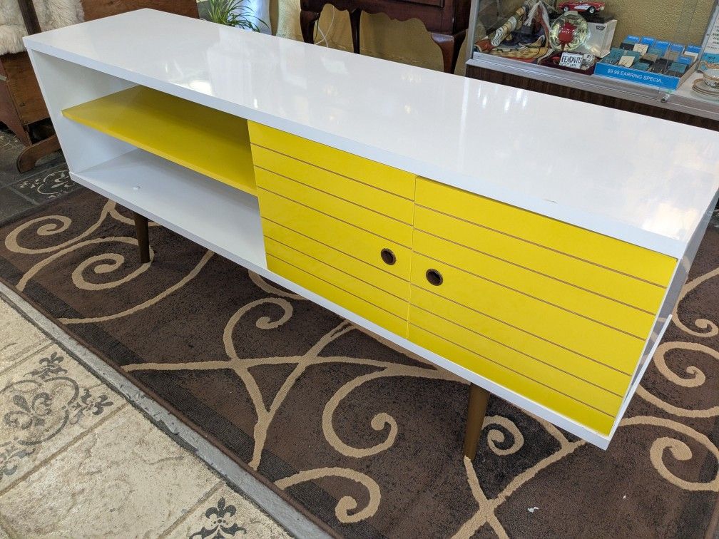Mid-Century modern credenza/ TV stand banana, yellow and white measures 63 in Long 25 and 1/2 in high 15 in deep