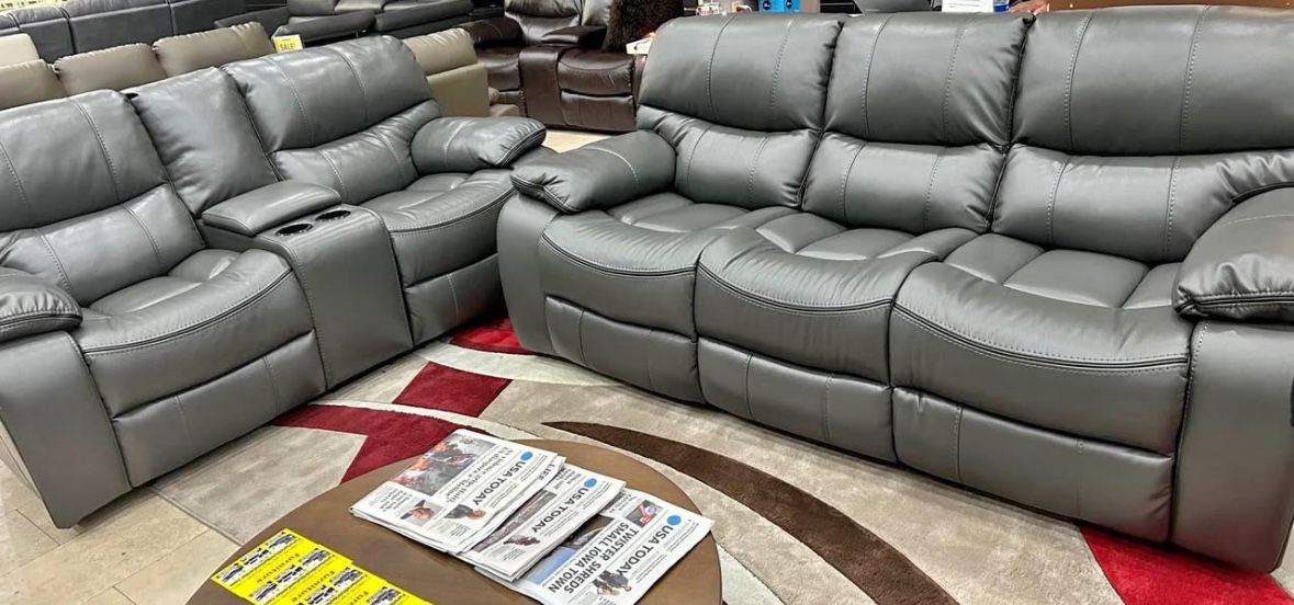 Summer clearance sale. Madrid, gray leather reclining sofa and loveseat set now $1199. Easy finance option. Same-day delivery.