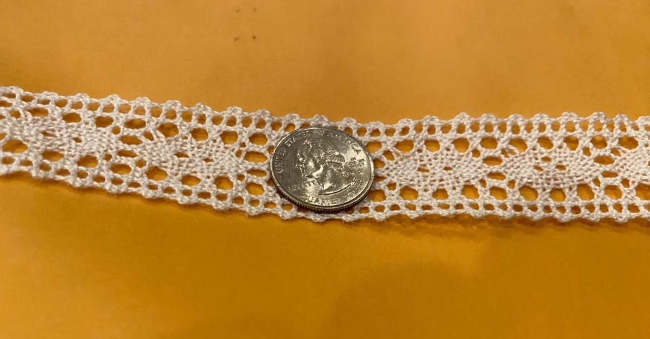 1.5” wide commercially crochet trim 2 yards