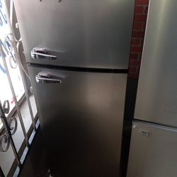 New Frigidaire stainless steel top and bottom refrigerator  small