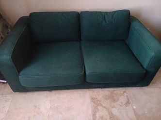 Nice small green couch