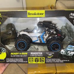 Brookstone® ROADSTER RACER 2.4GHz R/C VEHICLE POWERFUL MOTOR