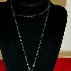 costume jewelry necklace with heart charm and rhinestones -

