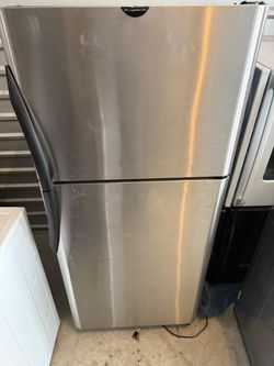 GE Stainless Steel top freezer refrigerator