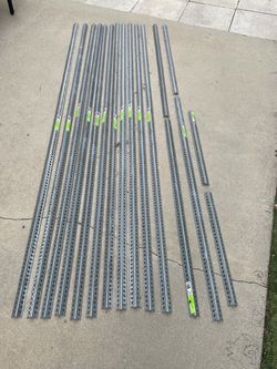 Lot of Everbilt 1-1/4 in. x 8 ft. - 18 Gauge Thick Zinc Plated Slotted Steel Angle