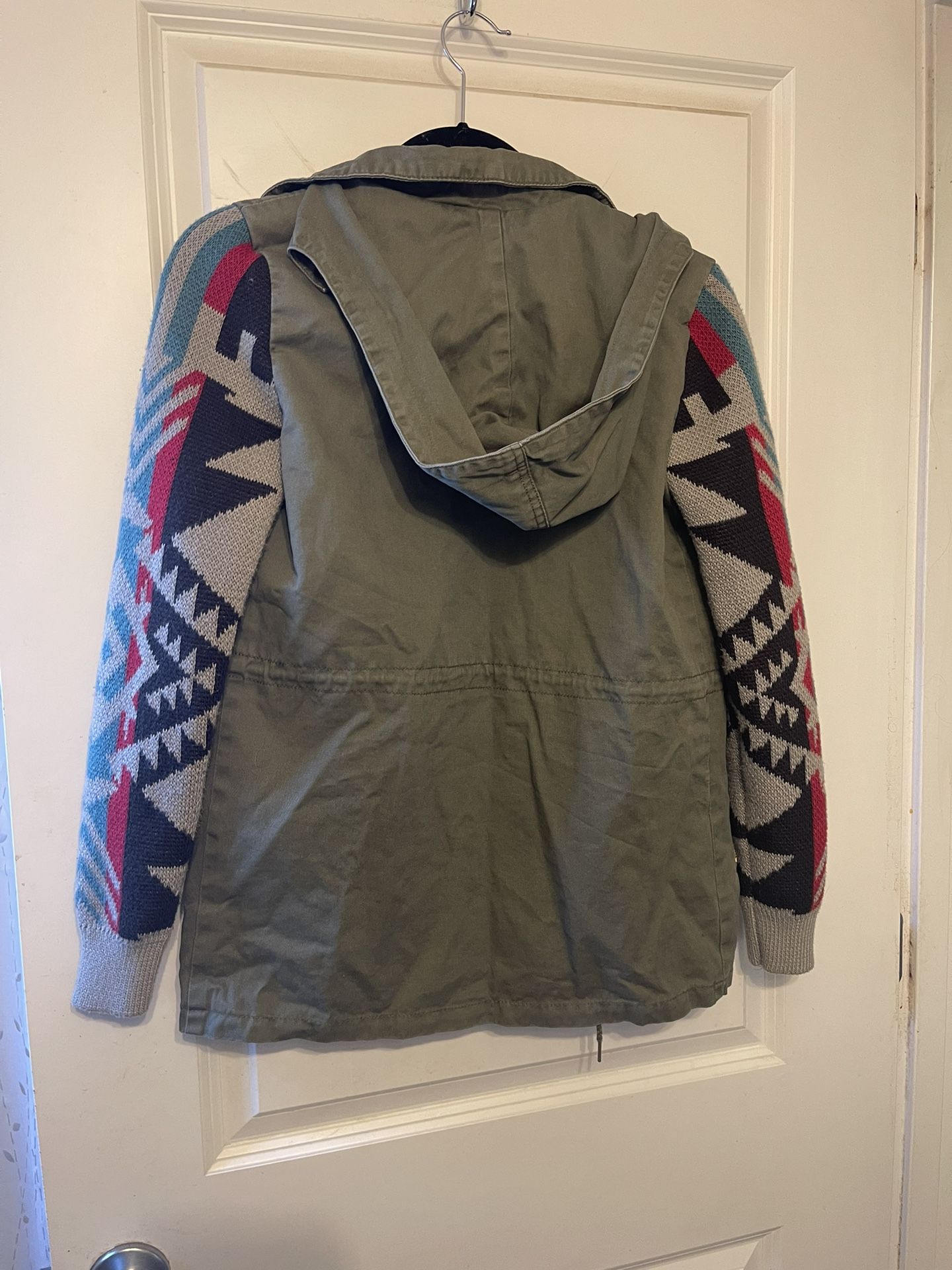 Thread & Supply Jackets & Coats. Size XS. Olive Color Jacket With Hoodie And Sweater Printed Sleeves. Zipper And Snap Closures. Zippered Pockets