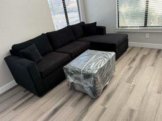 Brand new black sectionals with free ottoman