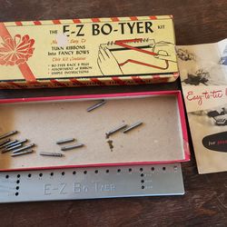 THE E-Z BO-TYER
