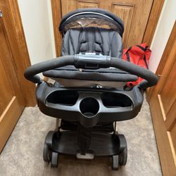 Graco double stroller with trays and canopys