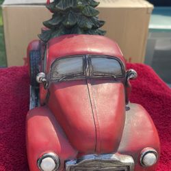 Title: Vintage Red Pickup Truck Christmas Decor with Tree