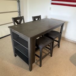 Table with chairs and stools