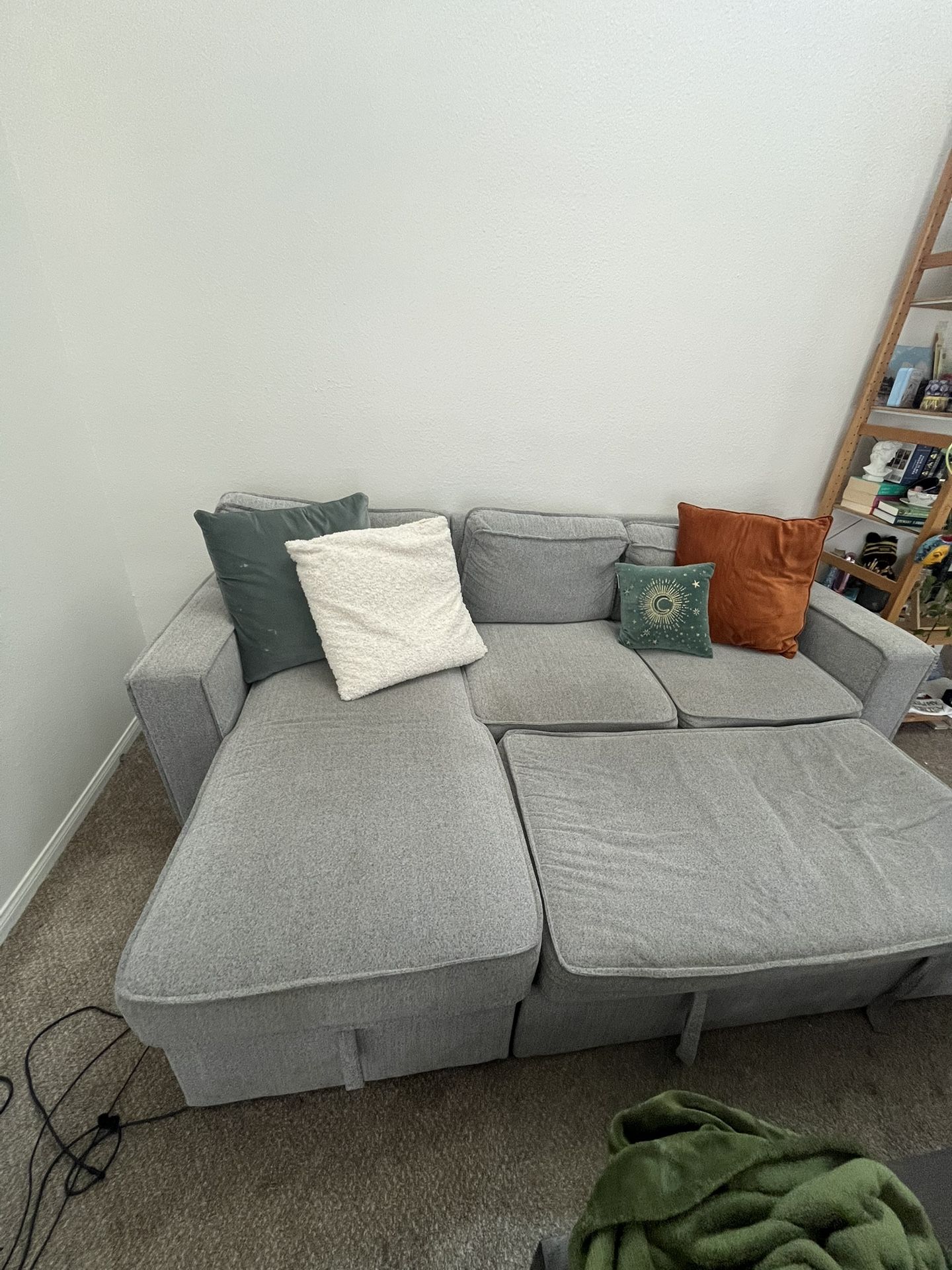 Sectional pull out couch with storage