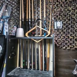 8 Pool Sticks In Very Good Condition All Stright  And All Unscrew And Wall Stand And Chalk.and 9 And 8 Ball Racks.   $30 