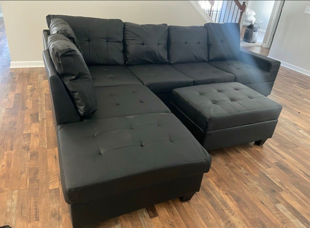 Black Leather Sectional with Storage Ottoman 