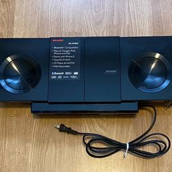 Sharp DK-KP85P Slim Micro System features a top-mounted dock for Apple Lightning devices The system also supports Bluetooth technology for wireless