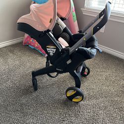 Baby Girl Pink  Doona Car seat/stroller 
