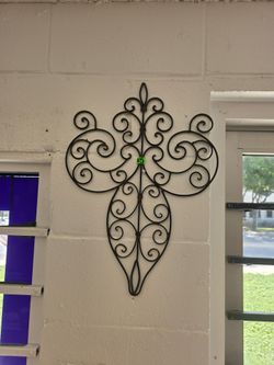 Lightweight metal wall scroll, cross, roughly 15" tall