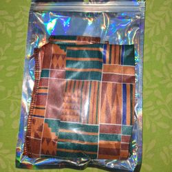 durag with a Kente cloth or African print pattern