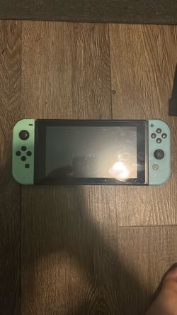 Nintendo Switch with Mint Green Joy-Cons
