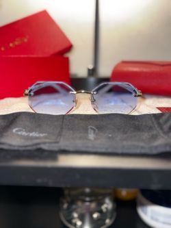 Luxury sunglasses (Cartier Buffs)