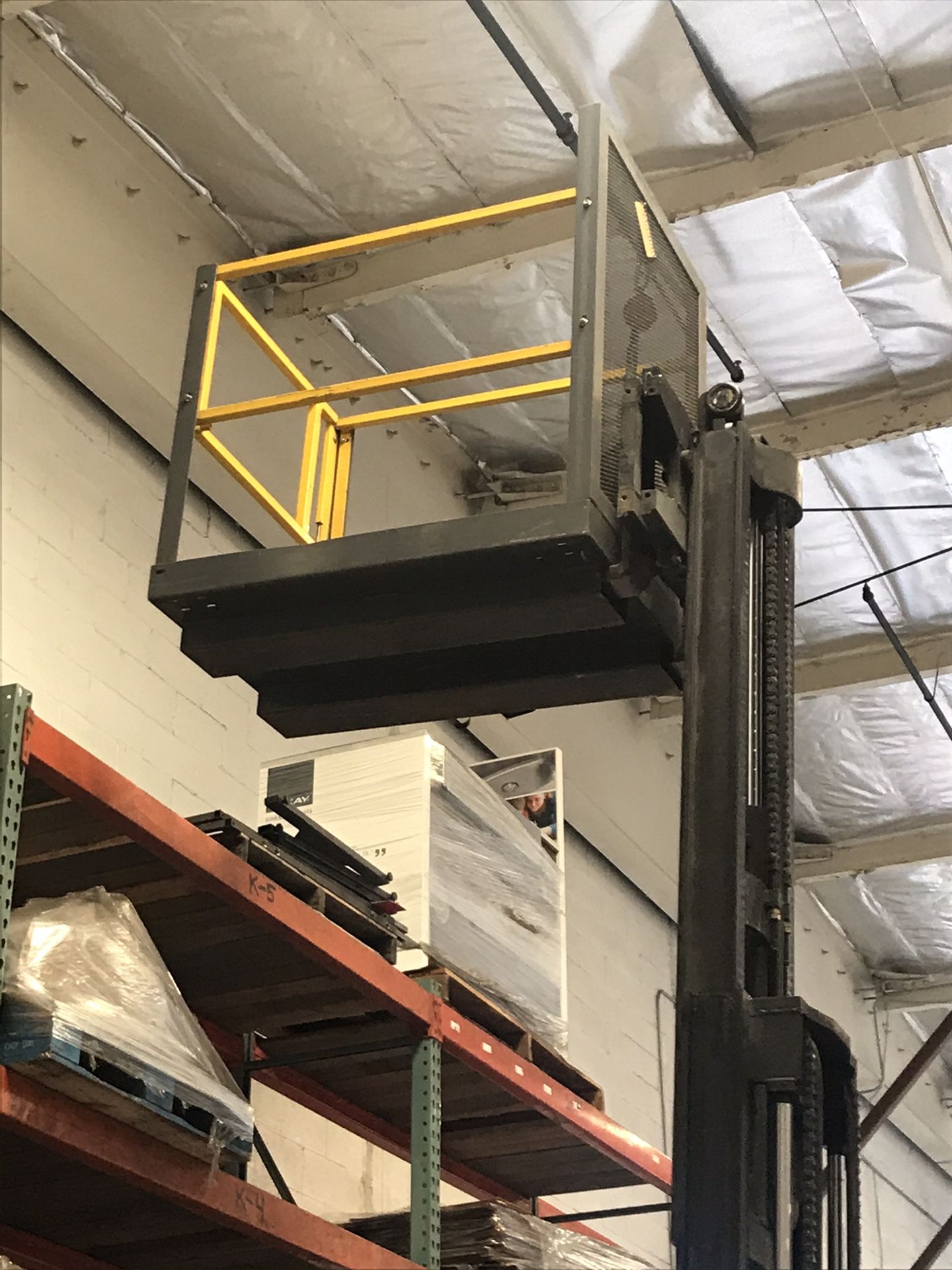 Forklift cages with harness.