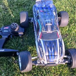 Traxxas 1/10 Scale Rustler 2WD Stadium Truck, Blue car with remote and battery and charger