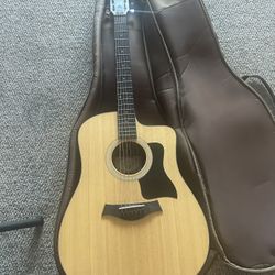 Taylor 11CE Acoustic Electric Guitar.