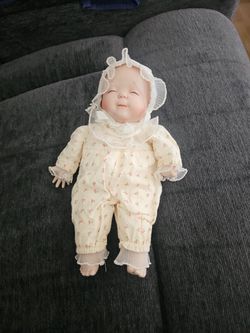 Porcelain Baby Doll with Bonnet