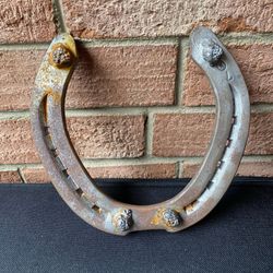 Vintage rustic horseshoe with some rusting and patina. Do you own a lucky horse shoe? Here you go!