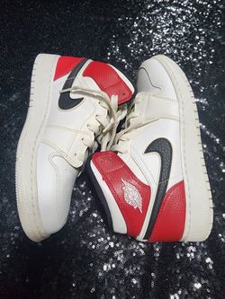 Nike Air Jordan 1 Mid sneaker in the "White Chicago". 