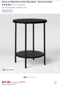 Black, round side table