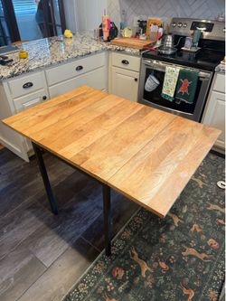 West Elm mango wood convertible dining table - $500