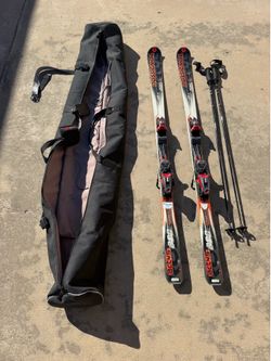 Skis, bindings, poles and a ski bag!