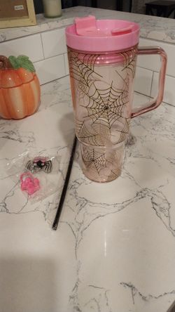 Pink acrylic double walled spider tumbler with charms 40oz