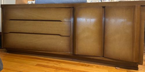 Beautiful matching bedroom furniture set in a warm wood finish