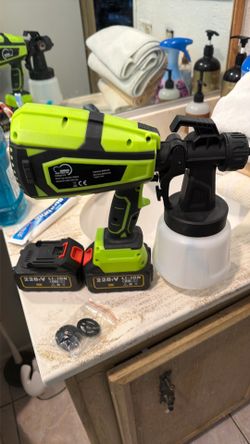 Battery operated paint sprayer